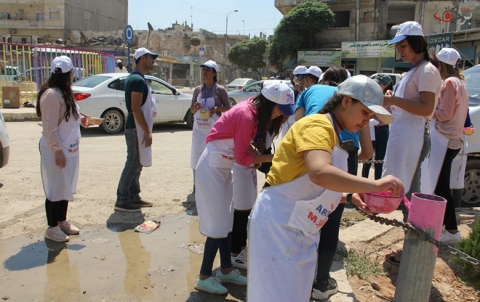 حملة طلاء وتزيين في ساحة آزادي وأعمدة الشوارع بمركز المدينة